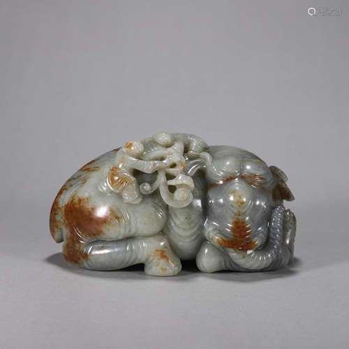 A jade figure and elephant ornament