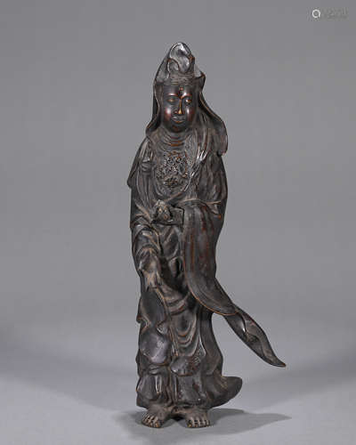 A copper Guanyin statue