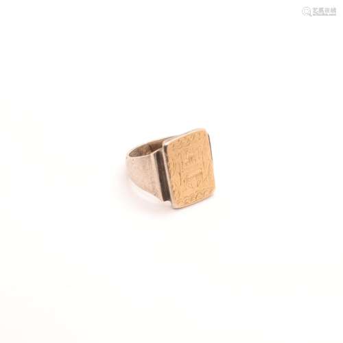 BAGUE "H" EN OR ET ARGENT<br />
Plaquette gravée d...