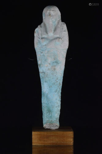 AN ANCIENT EGYPTIAN FAIENCE SHABTI