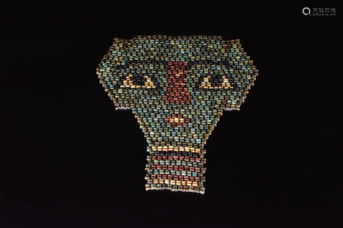 AN EGYPTIAN FAIENCE BEADED MUMMY MASK