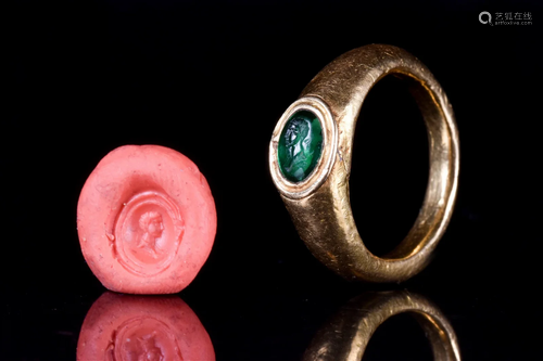 ROMAN GOLD RING WITH EMERALD STONE AND IMPERIAL PORTRAIT