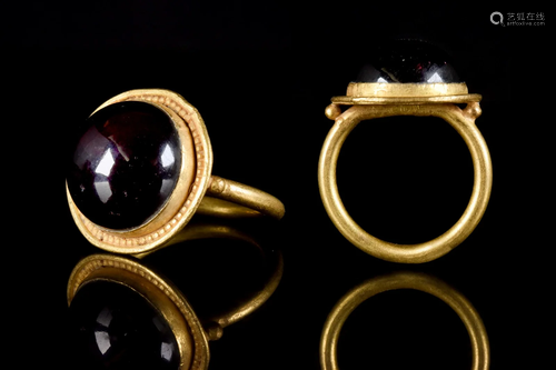 MEROVINGIAN GOLD RING WITH GARNET CABOCHON