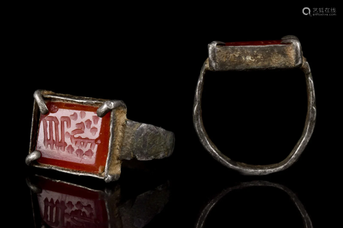 ISLAMIC TIMURID SILVER RING WITH CARNELIAN INTAGLIO