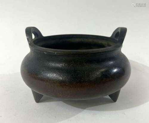 A Chinese Bronze Tri Footed Censer with Twin Handle Detail