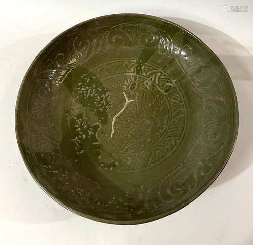 A Large Chinese Longquan Celadon Charger with Incised Floral...