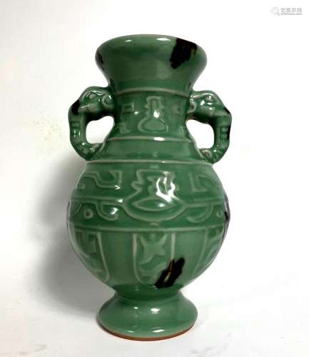 A Chinese Longquan Celadon Double Handle Vase