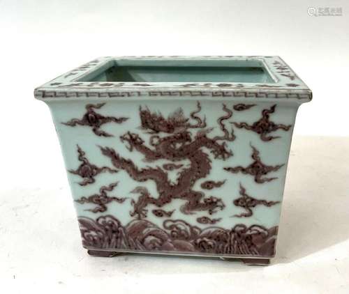 A Chinese Red & White Porcelain Planter Depicting a Drag...