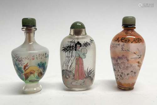 Three Chinese Glass Snuff Bottles one with Crane Detail