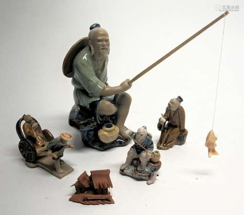 A Collection of Chinese Glazed Clay Figures including a Fish...