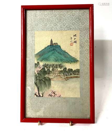 A Chinese Painting Depicting a Mountain Scene in a Red Frame