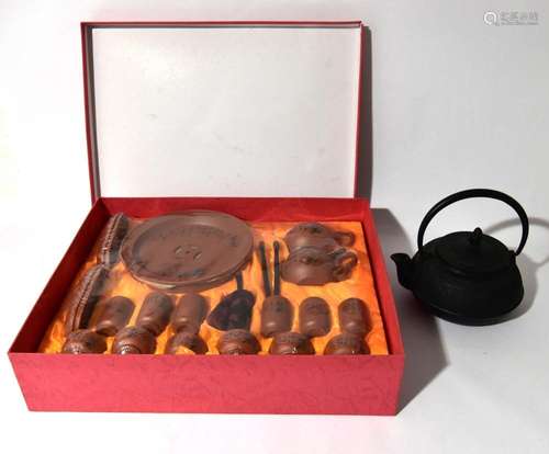 A Set of Chinese Yixing Clay Tea Set & an Iron Teapot