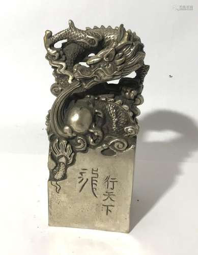 A Chinese Cast Silvertone Metal Dragon Seal