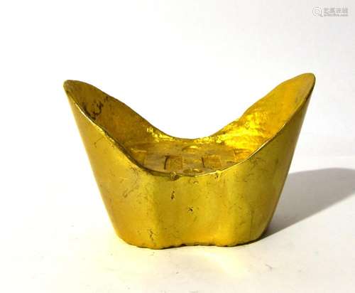 A Chinese Gold Colour Metal Facsimile Ingot