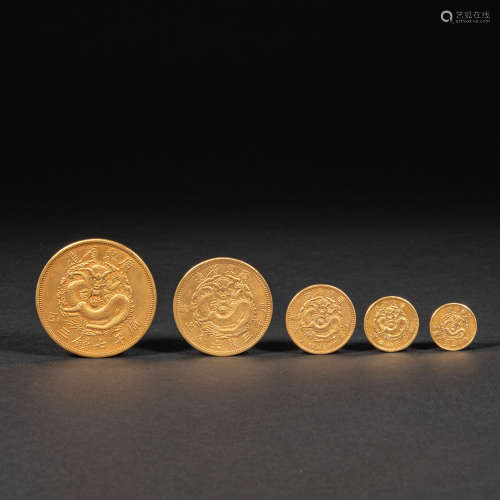 A SET OF CHINESE GOLD COINS