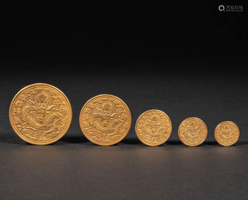 A SET OF CHINESE GOLD COINS