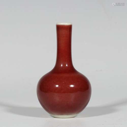 red glazed vase