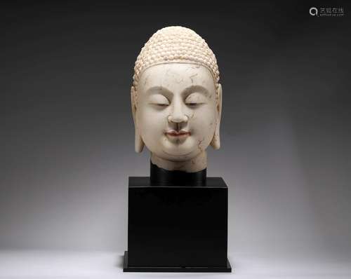 White marble Buddha head