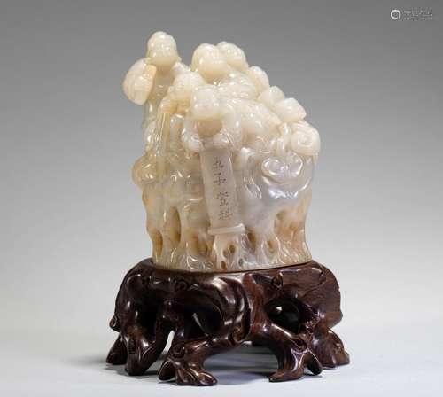 Shanzi, a white jade figure in the Qing Dynasty