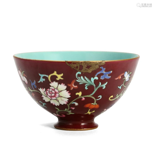 A RED-GROUND FAMILLE-ROSE FLORAL BOWL