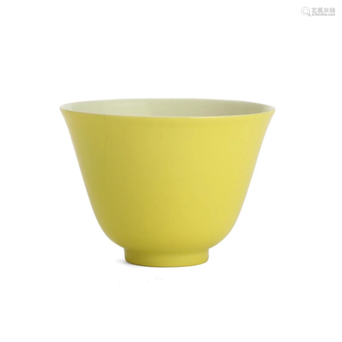 A YELLOW-GLAZED CUP