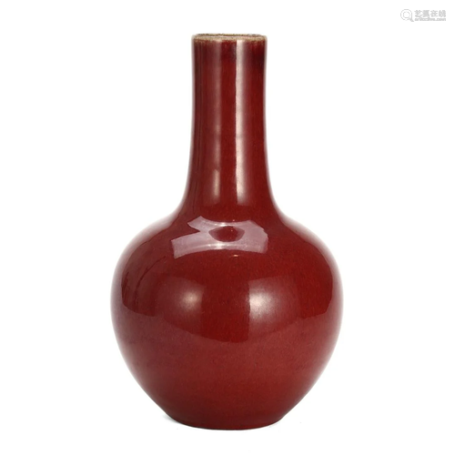 A RED-GLAZED VASE