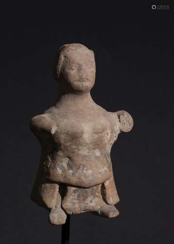 AN INDUS VALLEY HARAPPA TERRACOTTA SEATED FEMALE FIGURE, 2ND...