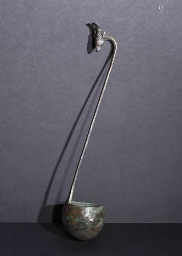 A GRECO PERSIAN PERIOD BRONZE LADLE WITH A GOAT HEAD, 400-30...