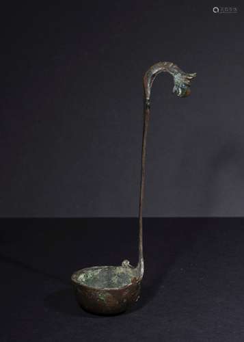 A GRECO PERSIAN PERIOD BRONZE LADLE WITH A GOAT HEAD, 400-30...