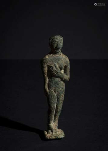 A STANDING NUDE FIGURE OF A FEMALE DEITY EARLY PERIOD, INDUS...