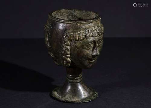 AN EASTERN ROMAN DOUBLE HEADED BRONZE CHALICE, CIRCA 3RD-4TH...