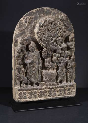 A GHANDARA SCHIST PLAQUE WITH A STANDING FIGURE OF A BUDDHA ...