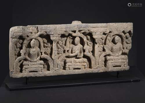 A GREY GHANDARA SCHIST CARVED PANEL WITH SEATED WORSHIPPING ...