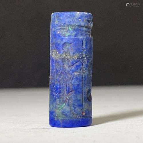 A WESTERN ASIATIC LAPIS LAZULI CYLINDER SEAL