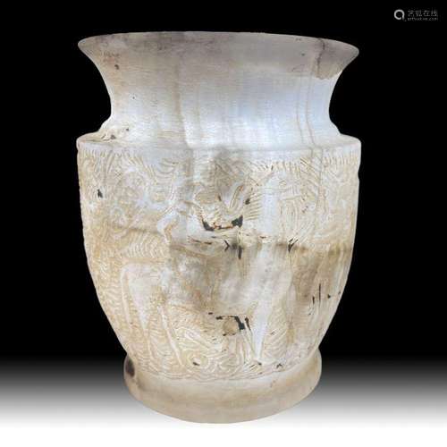 A CARVED SHELL TYPE JAR, POST SASANIAN STYLE AND PROBABLY LA...