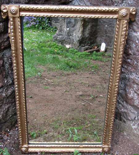 A 19th century gilt framed mirror, the repeating geometric d...