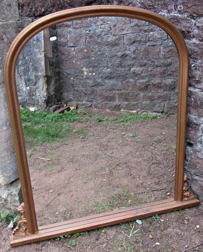 A 19th century arched overmantle mirror, the moulded frame w...