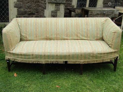 Georgian mahogany sofa with bow fronted outline, raised on s...