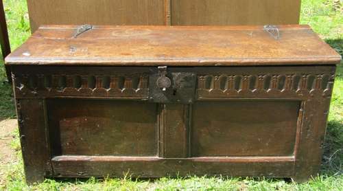 Small 18th century oak six plank coffer with repeating carve...