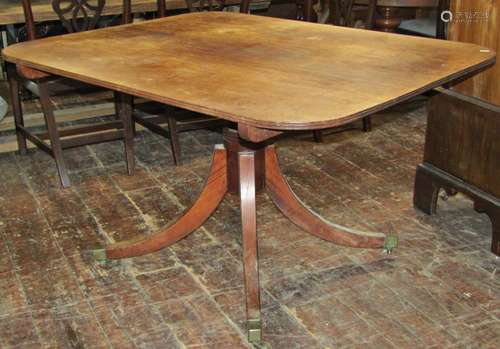 A Regency mahogany breakfast table, the rectangular top rais...