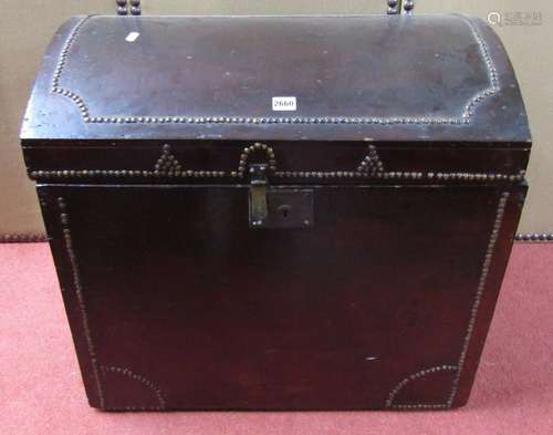 A 19th century pine trunk with domed lid and original staine...