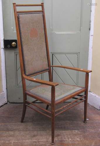 Arts & Crafts elbow chair on turned supports and rails, ...