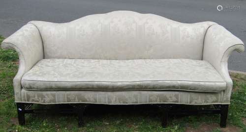 19th century camel back sofa with scrolled arms, the open fr...