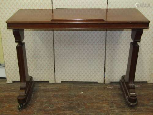 Mid-Victorian mahogany writing or reading table, the stretch...