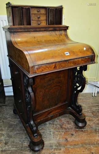 A Victorian walnut and figured walnut piano davenport, the p...