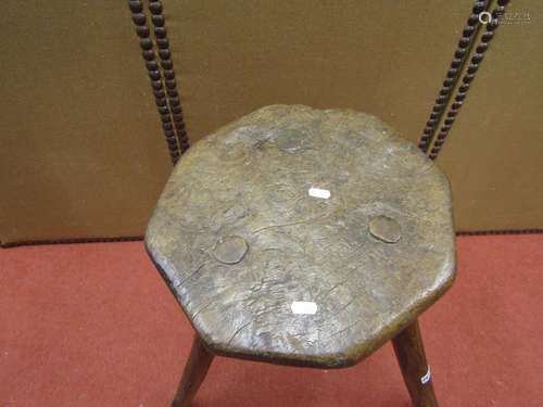 Early rustic stool, the top of octagonal form, raised on thr...