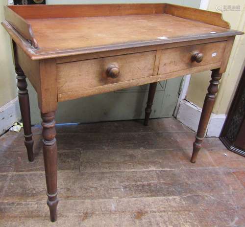 Victorian mahogany side table fitted with two frieze drawers...