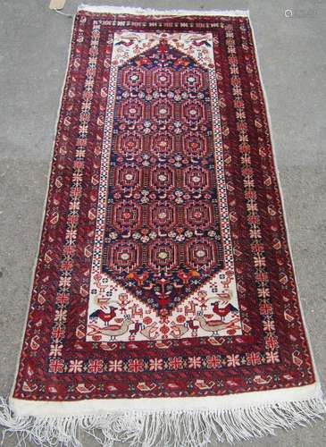 A mid 20th century Beloudj rug with a geometric central diam...