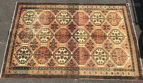 A large Bakhtiar carpet with eighteen alternating pink and w...