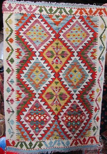 A Chobi Kilim with a multi coloured diamond pattern, 120cm x...